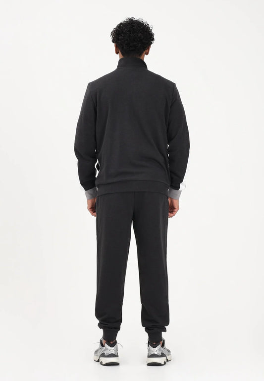 PUMA Tuta Essentials Block nera da uomo 694658-01