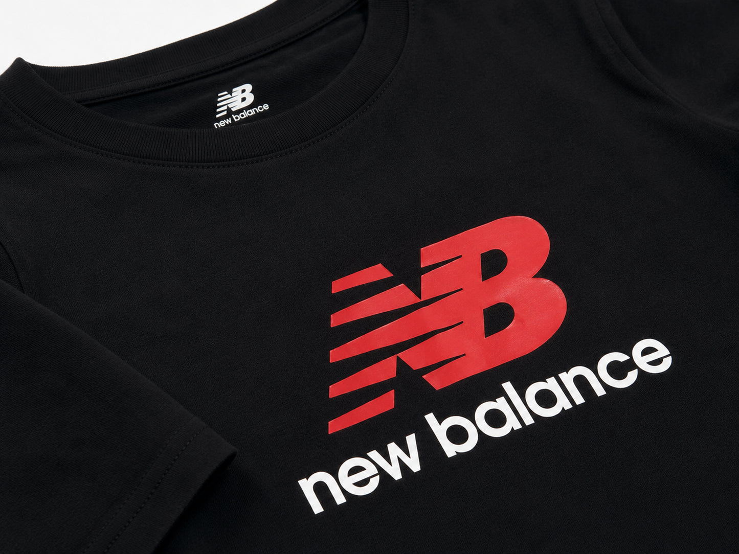 New Balance Jersey Stacked Logo Tee LAKB0253-BK | Unisex Bambino | Nero