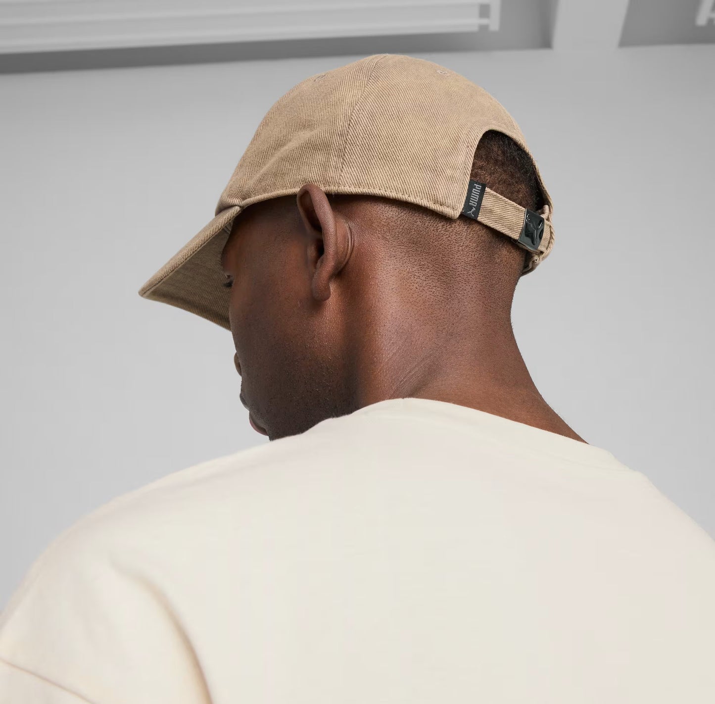 PUMA WARDROBE ESS METAL DAD CAP BROWN 025968-03