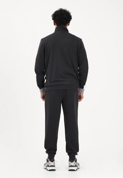 PUMA Tuta Essentials Block nera da uomo 694658-01