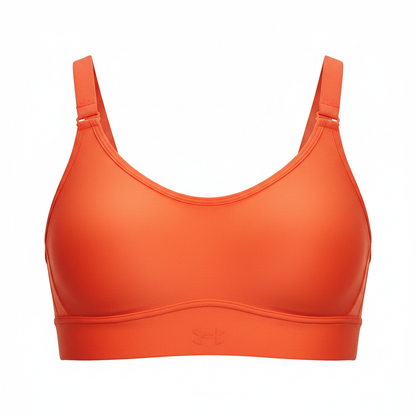 Under Armour Infinity 2.0 Mid reggiseno arancione flat lay sfondo bianco