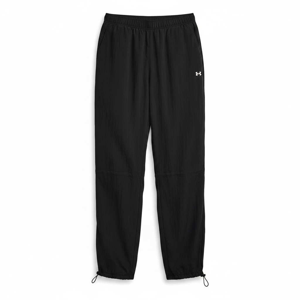 Under Armour Rival Woven Bungee Pant nera flat lay sfondo bianco