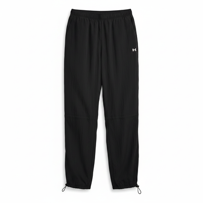 Under Armour Rival Woven Bungee Pant nera flat lay sfondo bianco