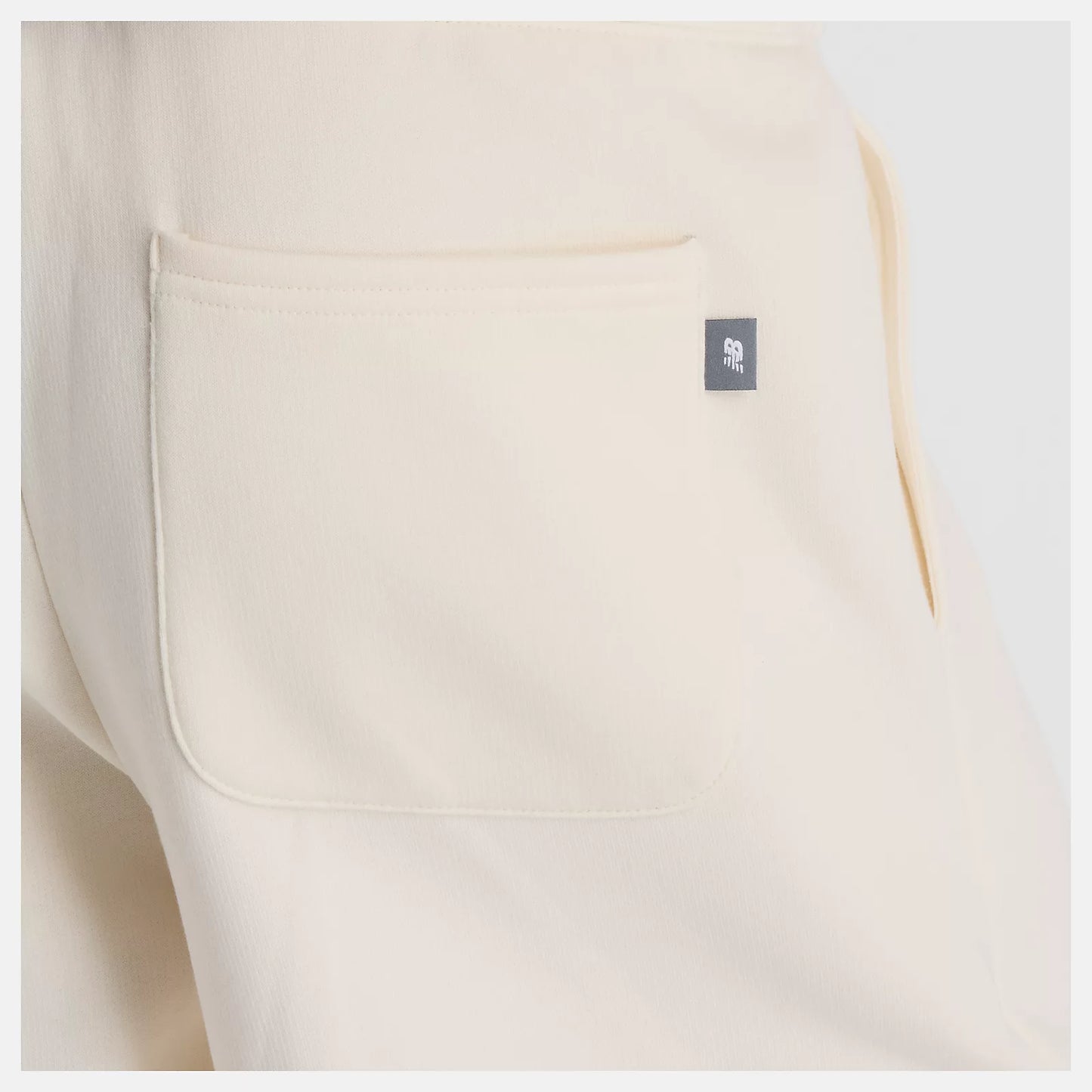 NEW BALANCE NEW LINEAR HERITAGE FLEECE BARREL LEG PANT - PERMAFROST WP53500PEF