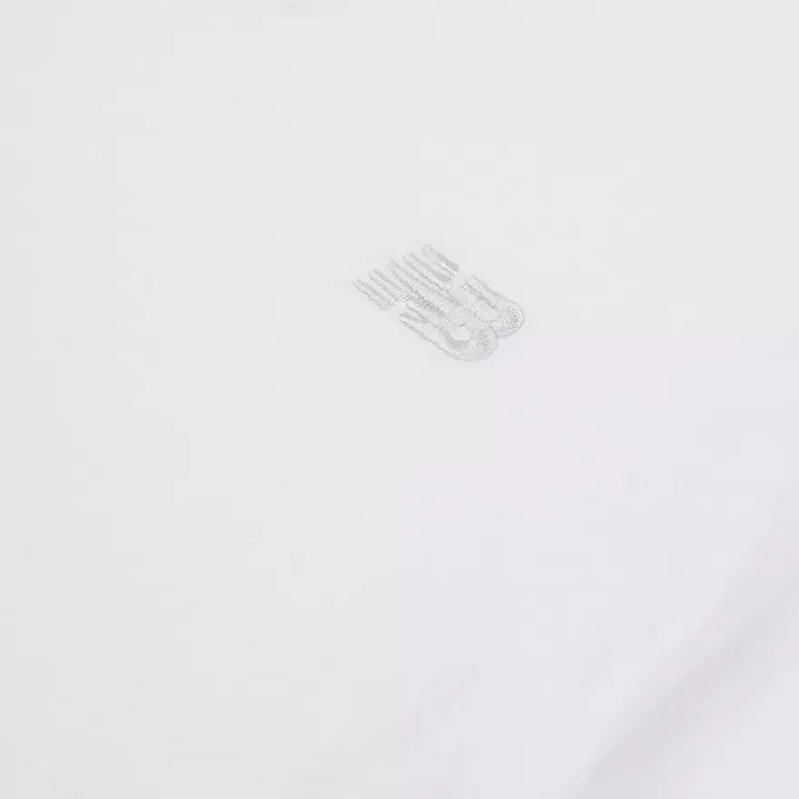 New Balance Jersey Small Logo Tee LAKB0001-BWE | Bambino | Bianco
